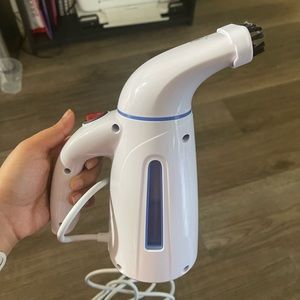 Handheld steamer with bag for travel